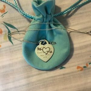 Return to Tiffany’s Heart Pendant and Chain with Arrow Heart Engraving.